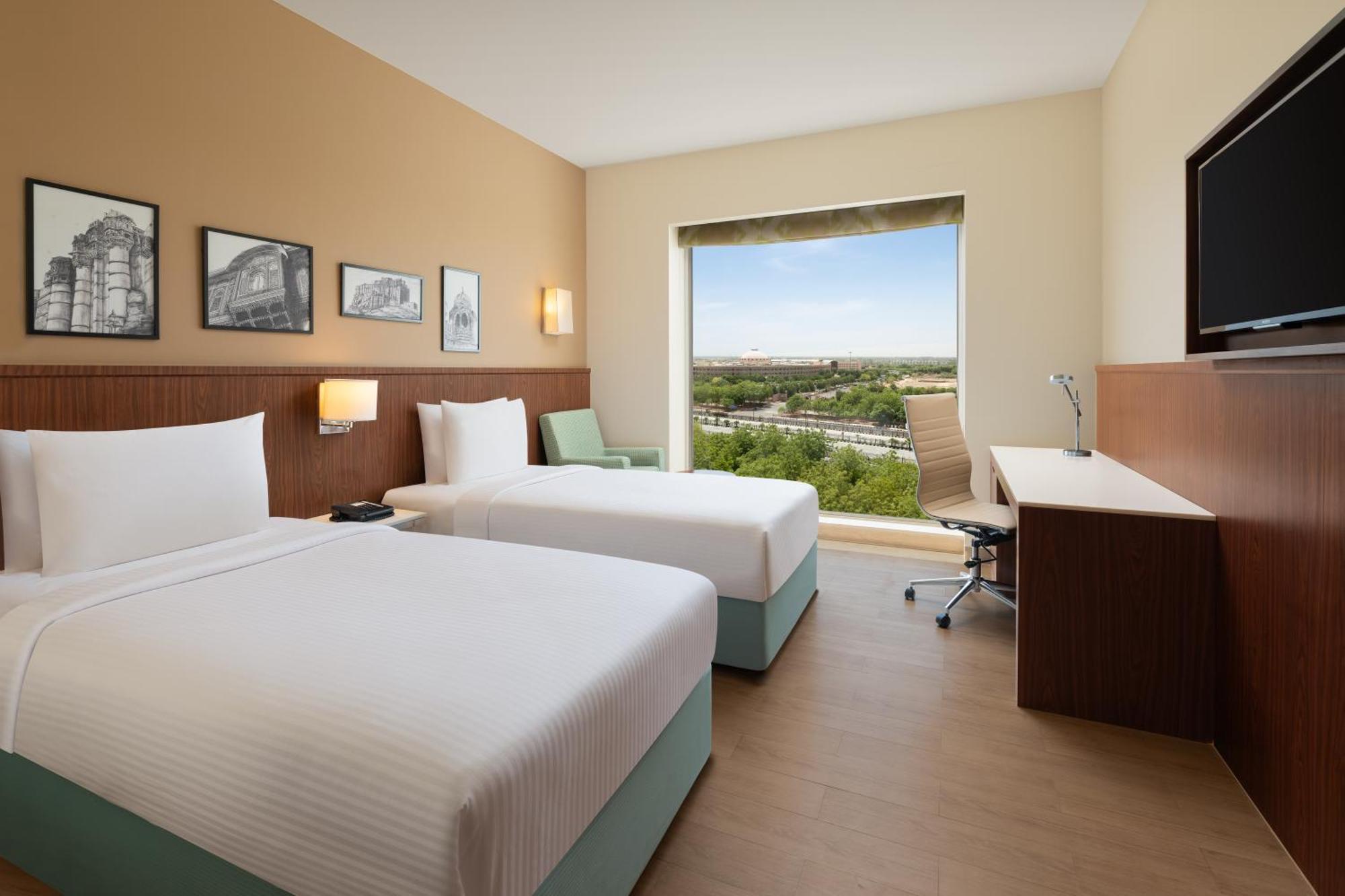 Premium Twin Room (15% Discount on food & soft beverage at Kava Restaurant, Happy Hours (Buy 1 Get 1) on IMFL beverages at the BAR)
